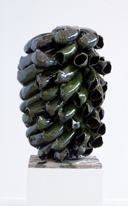Stack, green, 2009. Terracotta clay, extruded pipe elements, roughly modelled together in center of stack around a wheel-thrown bottom centre cone, white ball clay slip sprayed on, lead bisilicate-based transparent glaze with copper oxide, kiln shelf, electric kiln. H 80 x Dia. 50 cm. Private collection, London, Great Britain. Photo: Thomas Tveter